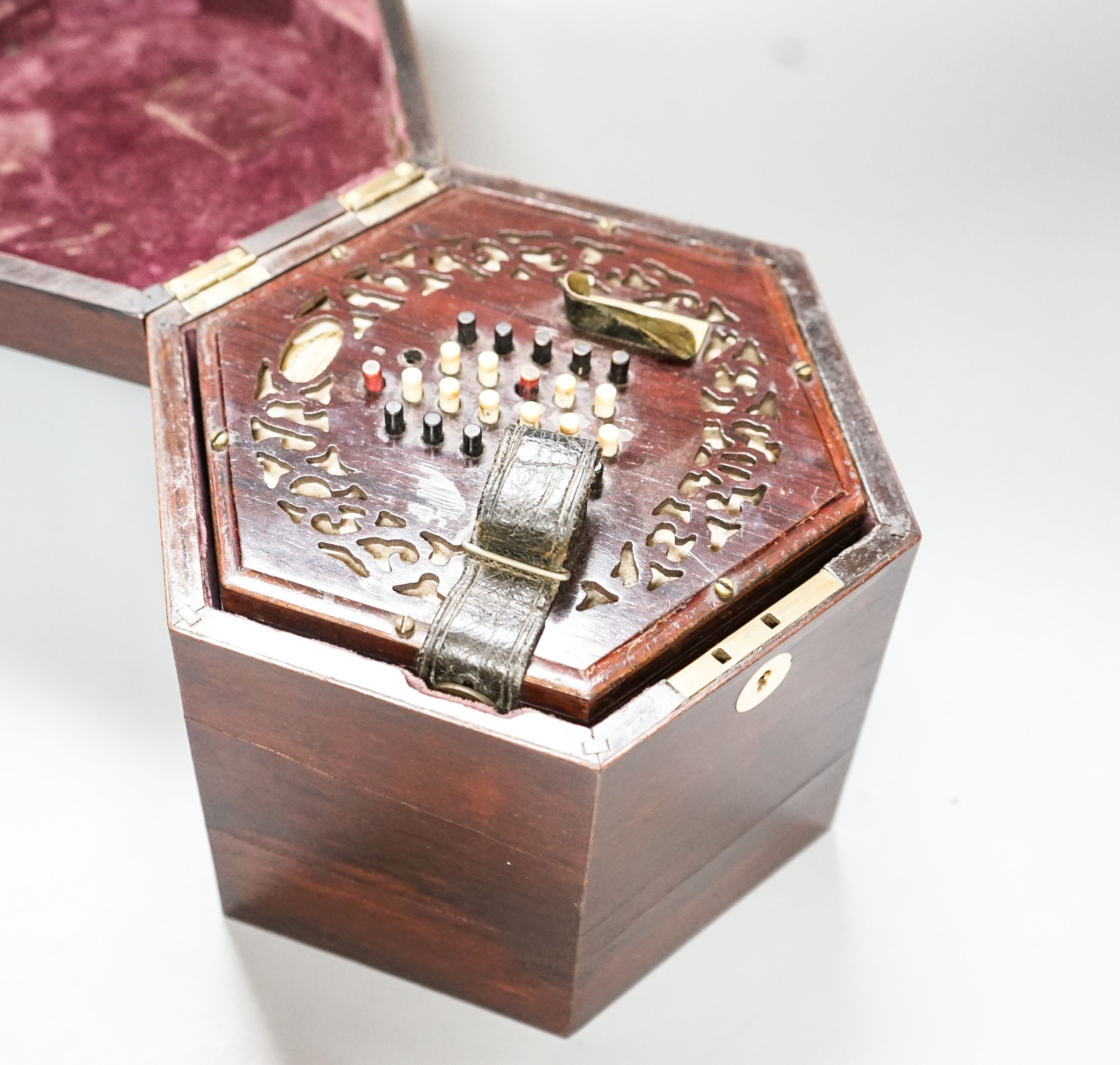 A Victorian Lachenal concertina with 48 buttons in rosewood case